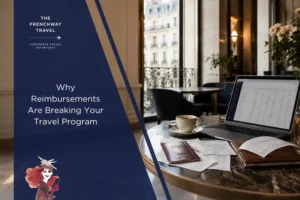 Paris café workspace with laptop, receipts, passport, and coffee for corporate travel expense management.