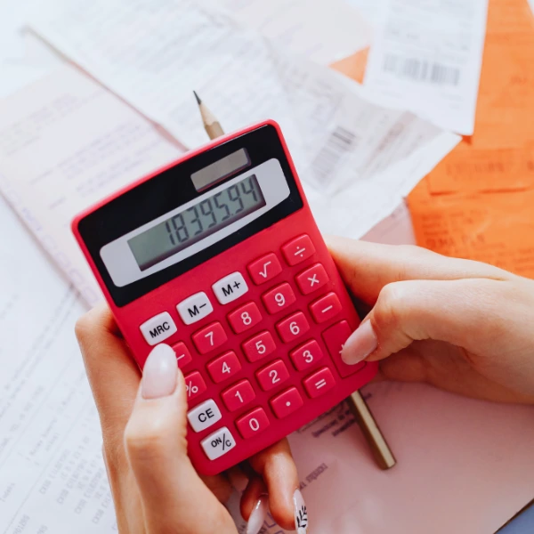 Calculating travel expenses with receipts and budget tracking_