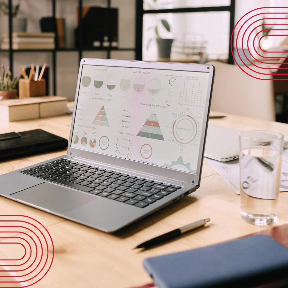 Laptop showing financial dashboard for structured travel expense management and real-time tracking